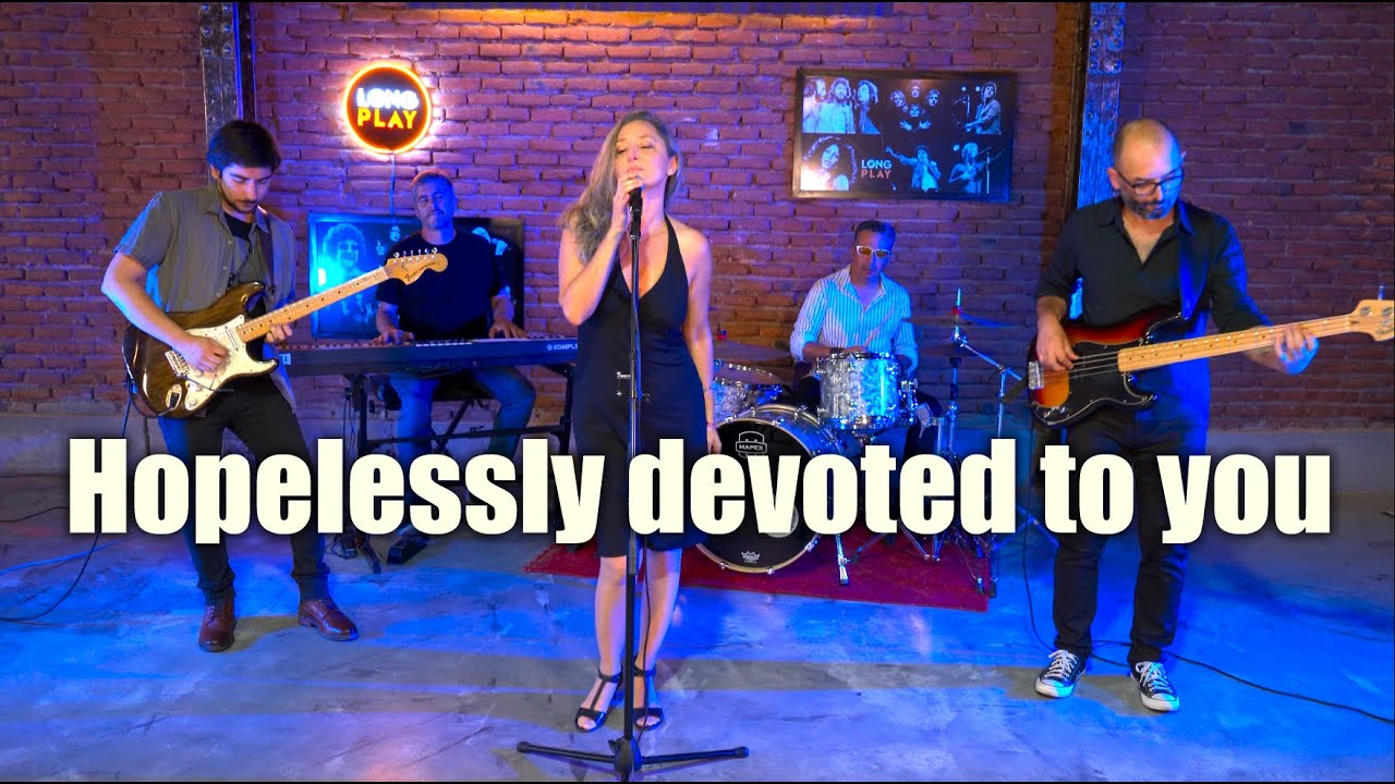 Olivia Newton-John's Iconic Cover of 'Hopelessly Devoted To You' 🎶