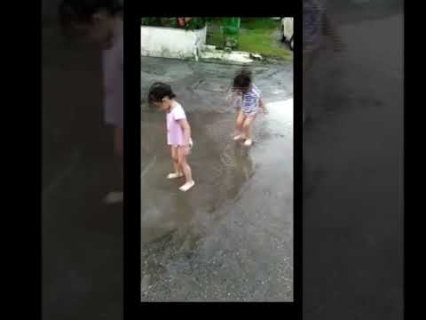 Twin Babies enjoy Rain #twin #babies #cute #