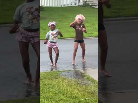 They Make Rainy Days Look So Much Fun! ⛈️☂️💃🏾 #dance #shorts #funny