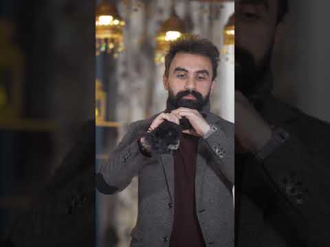 How to tie a scarf . Osama Elaraby