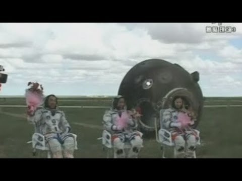 Chinese astronauts land after 15-day mission