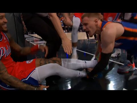 Kelly Oubre Jr can't stop laughing while Donte DiVincenzo trips him and starts fight