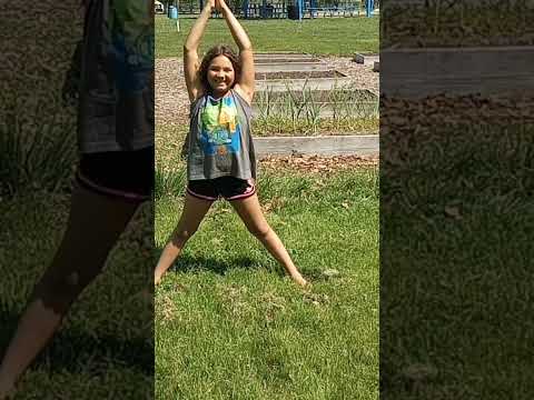 tickling Ella daughter yoga meditation community garden class good energy
