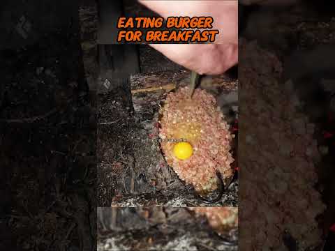 Burger for breakfast? Creator: Outdoor Boys #satisfying #camping #survival #outdoors #cooking