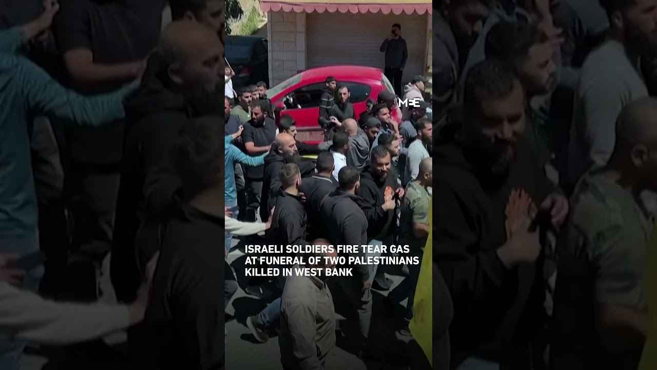 Israeli soldiers fire teargas at funeral of two Palestinians killed in West Bank
