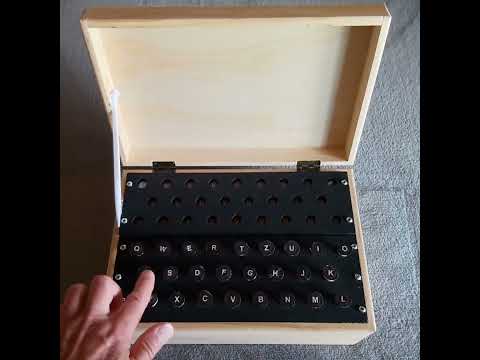 Simple Cipher Machine with Keyboard and Output panel with light fields
