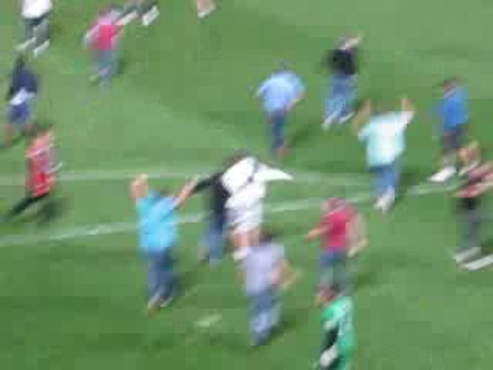 Fans on the pitch!! West Ham vs Millwall