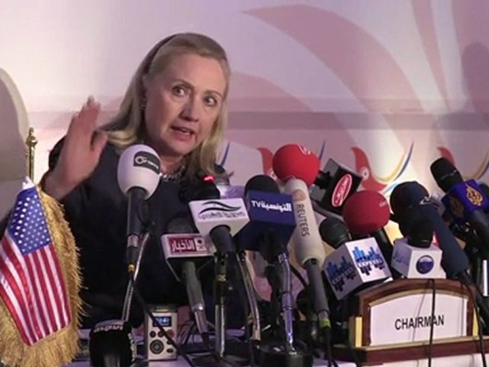 Clinton warns Assad of 'heavy cost' of crackdown