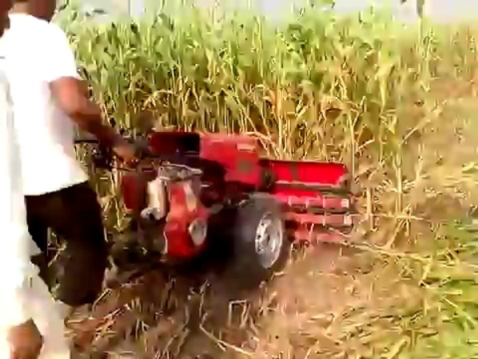 Reaper attached with Compact tractors