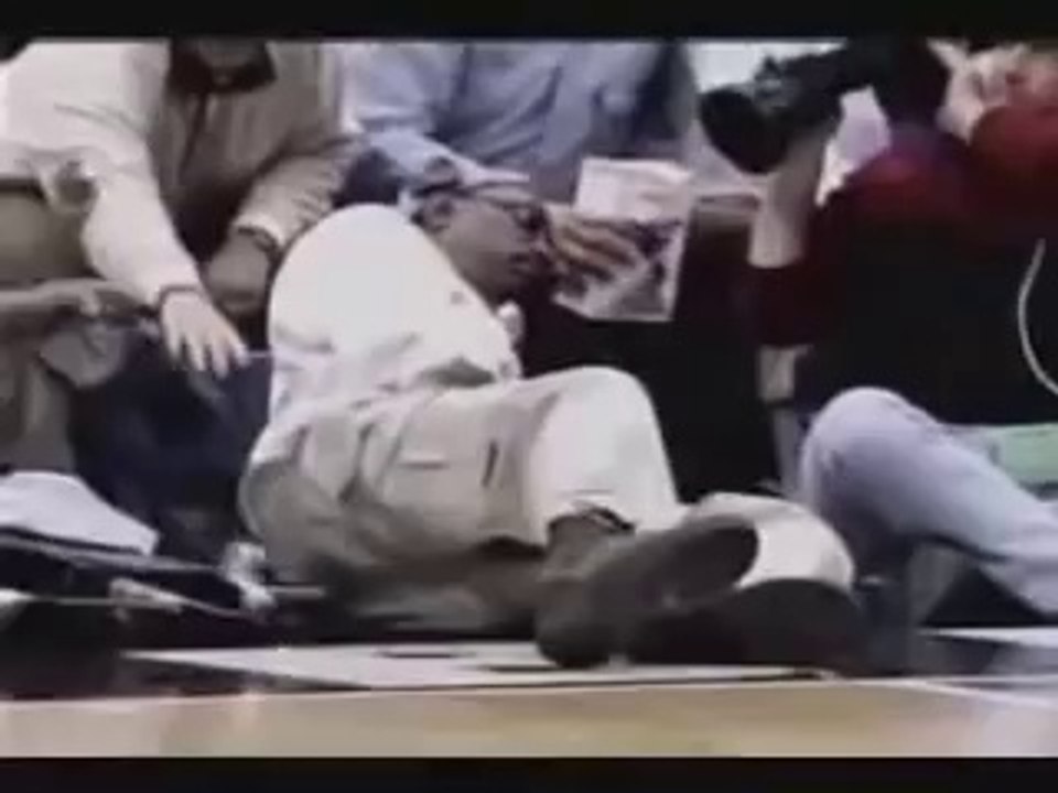 Dennis Rodman kicks cameraman