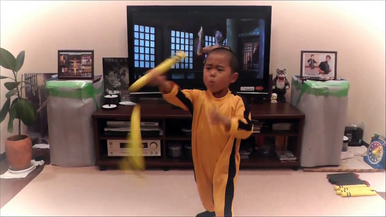 My son(5year old) acting Bruce Lee's nunchaku scene