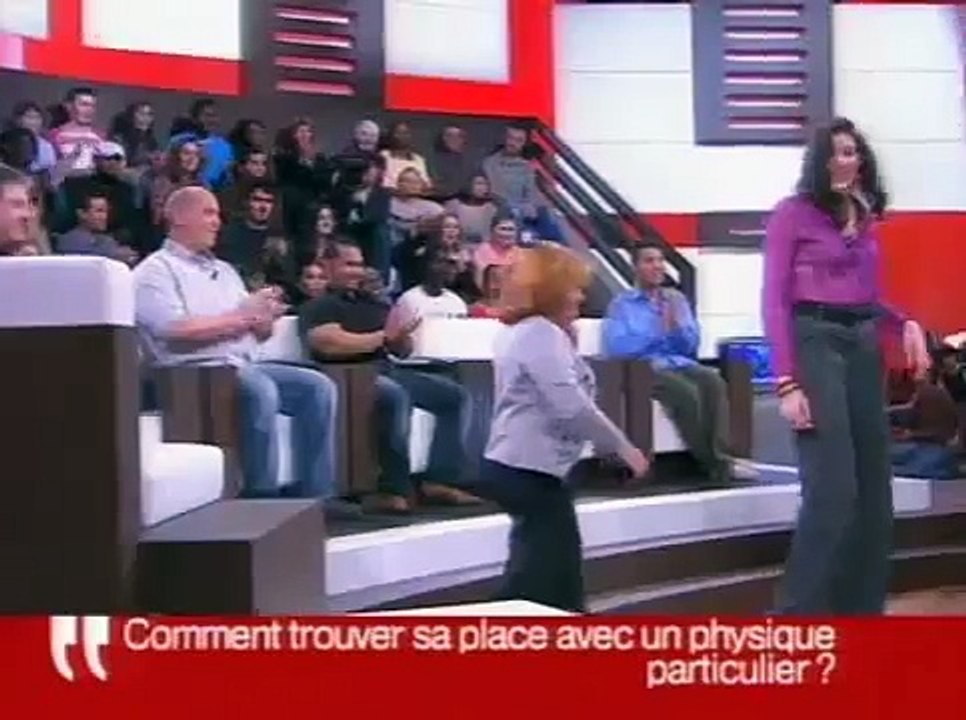 A very tall girl comparing height with a short girl