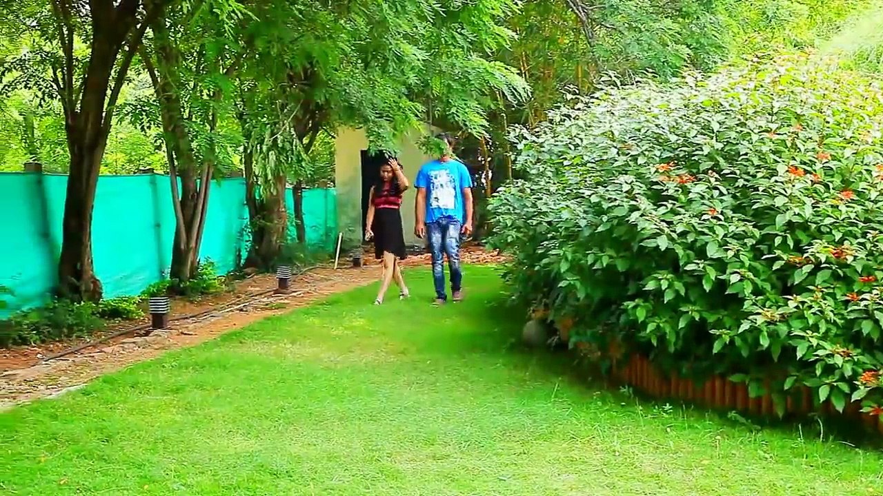 Diya - red and black dress in staircase