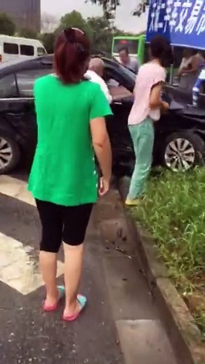 Road Accident in Beijing in China - Car in Canal