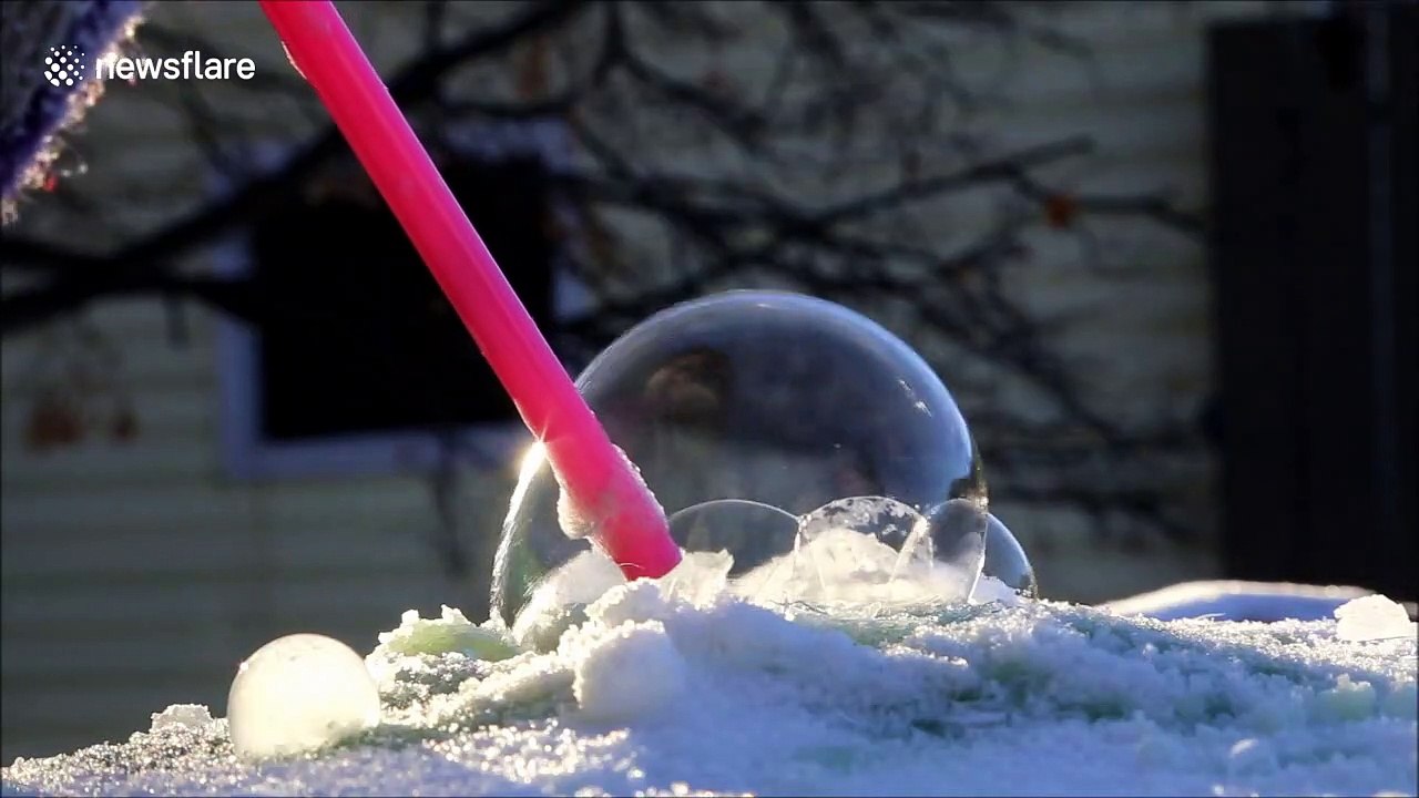 Beautiful footage of a bubble freezing at -30C in Canada's Saskatchewan
