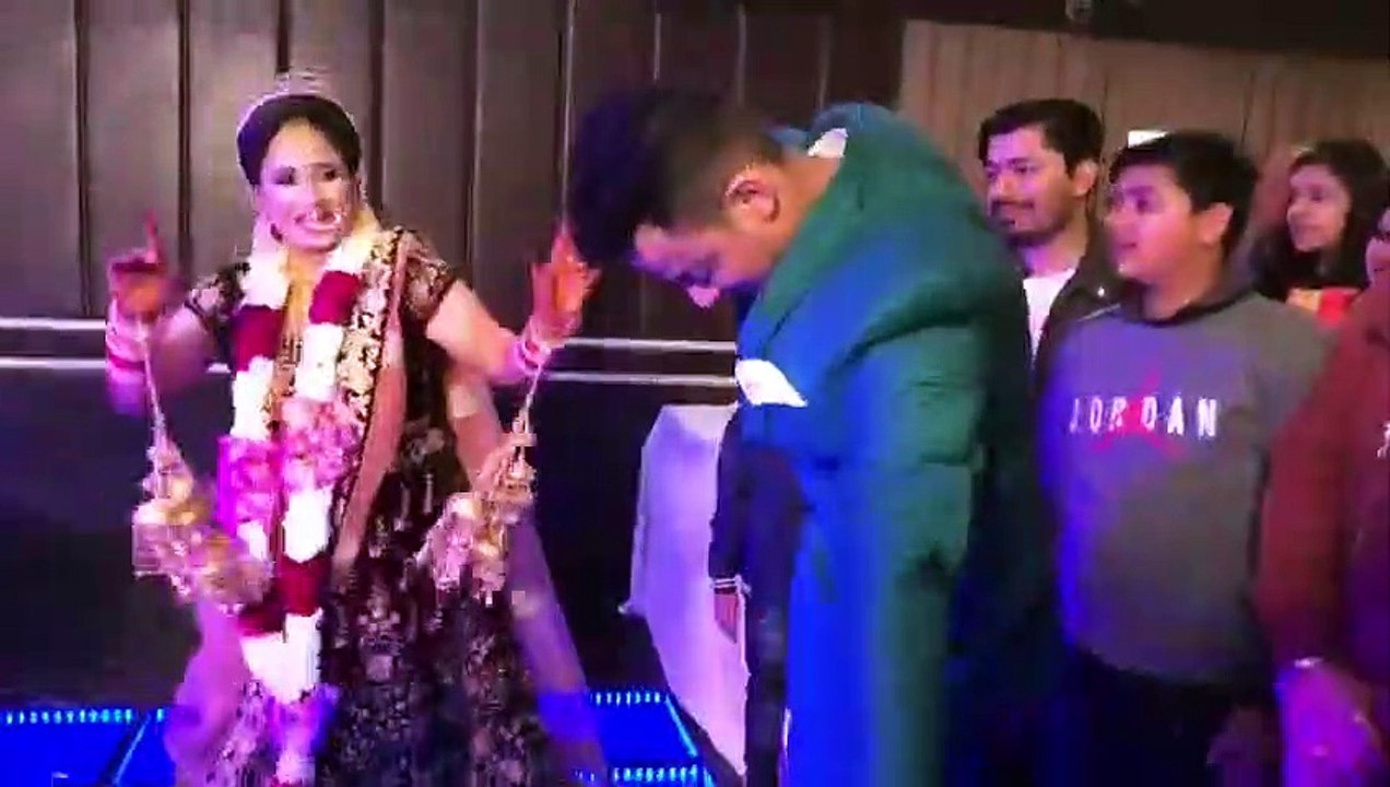 Bride and groom enjoying and dancing