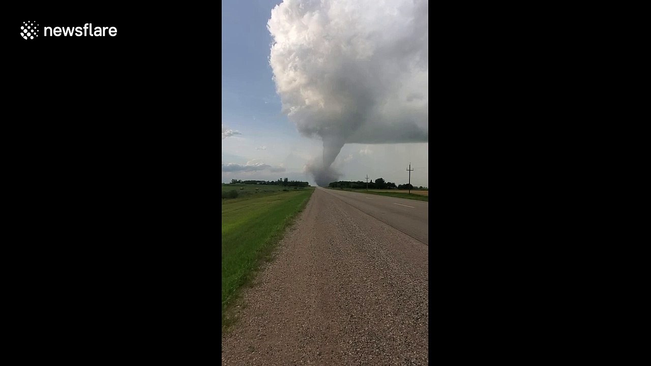 Large tornado rips through Canadian fields