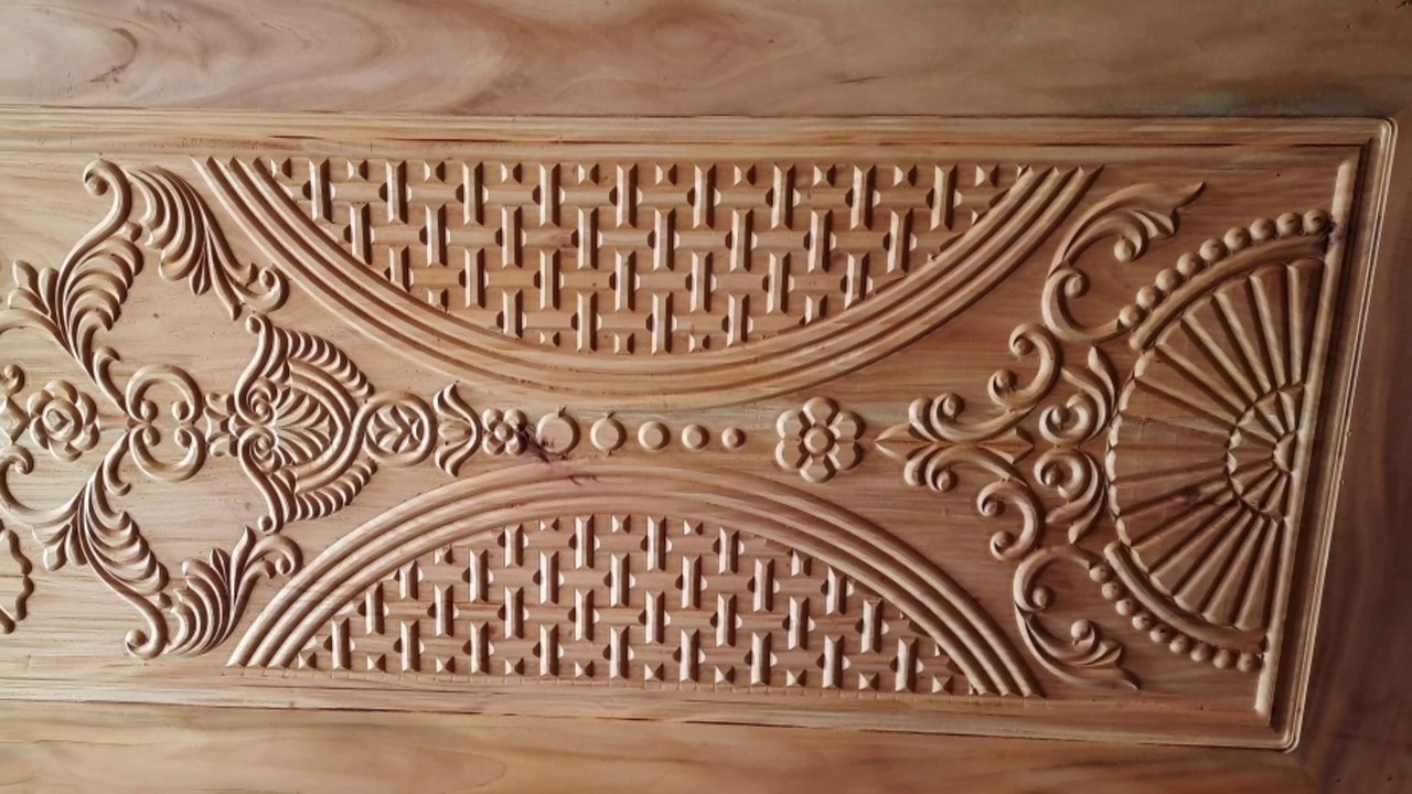 Very nice door design made of wood by CNC machine