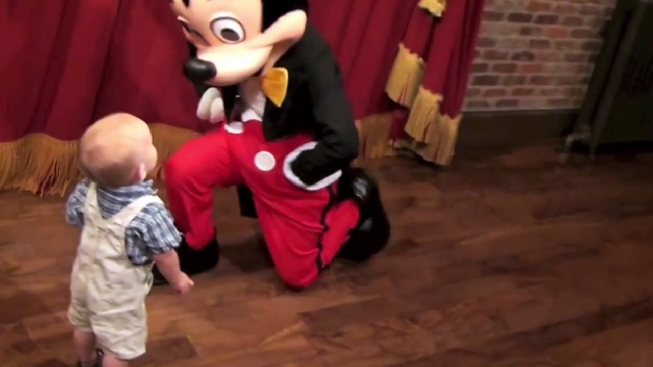 Baby Boy Hugging Mickey Mouse at Disney World