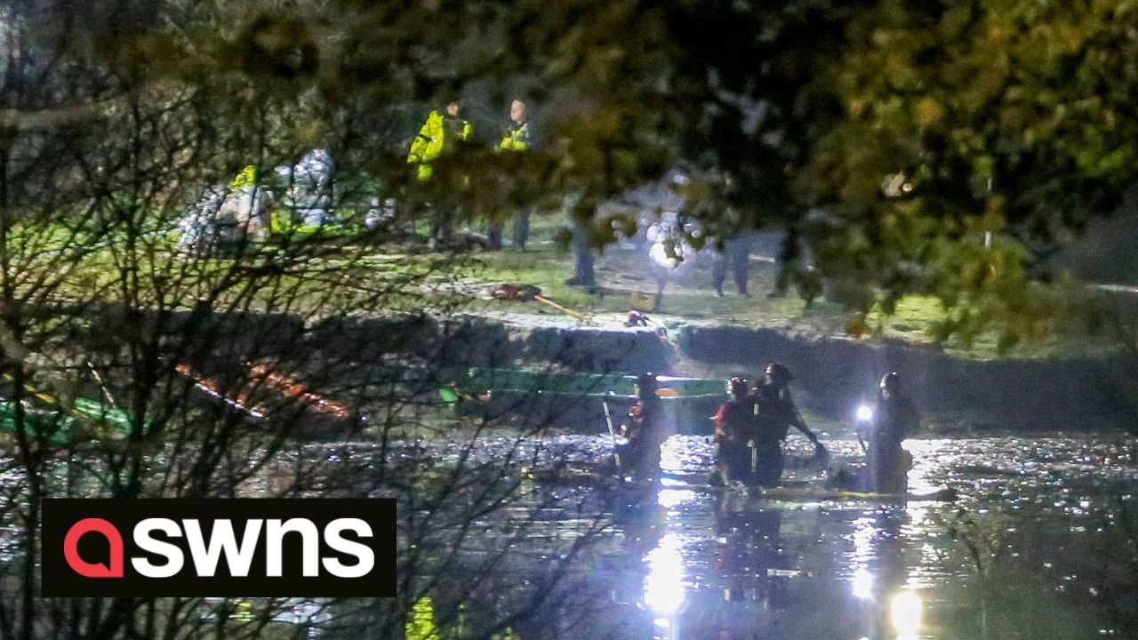 Rescue teams searching freezing lake for survivors after a number of people 'fell through while playing on ice' and are in a critical condition