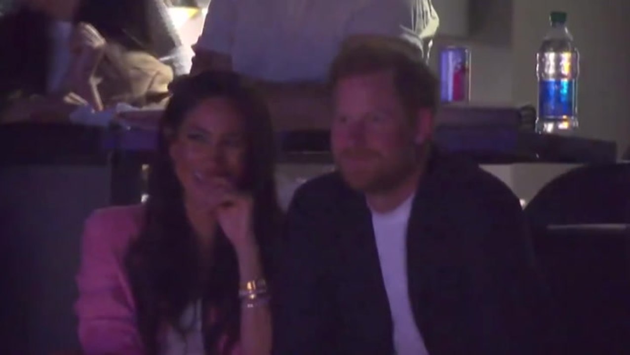 Harry and Meghan spotted laughing together at LA Lakers basketball game