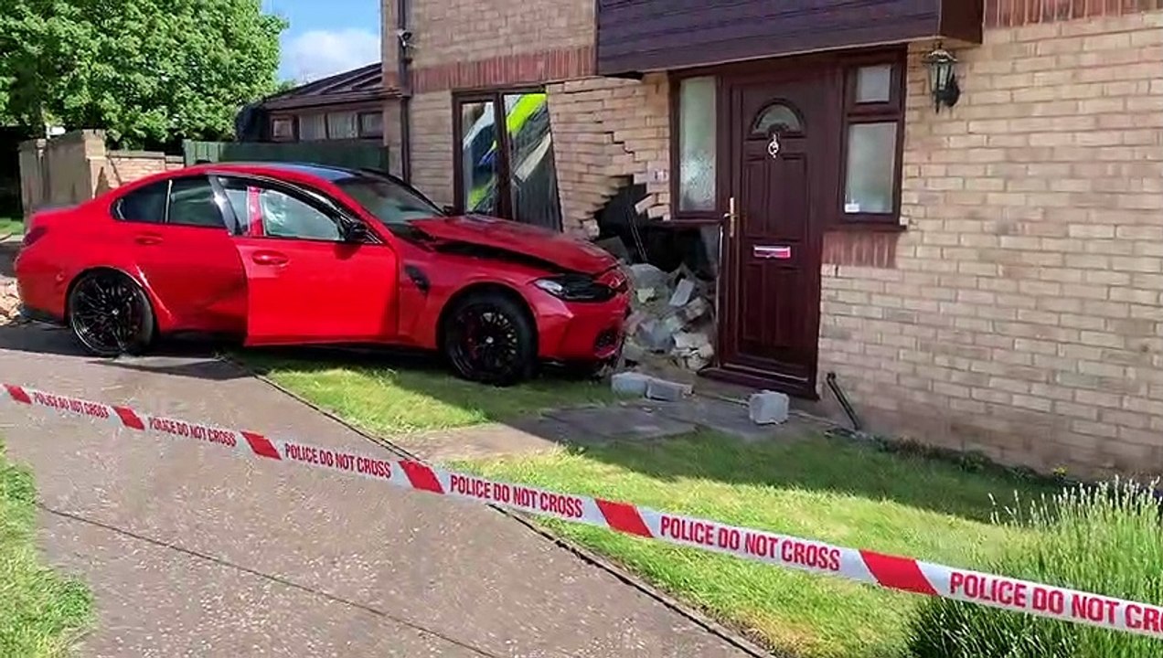 Car crashes into house