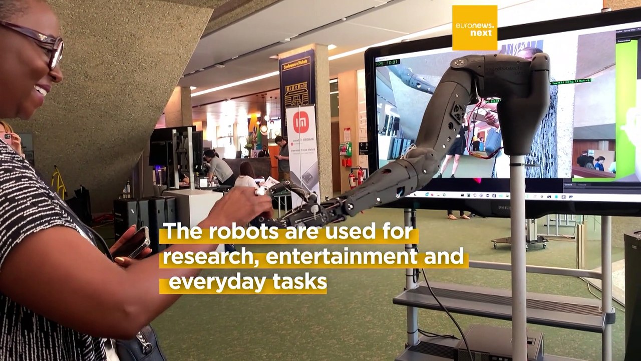 'We can help you', say robots at AI meeting