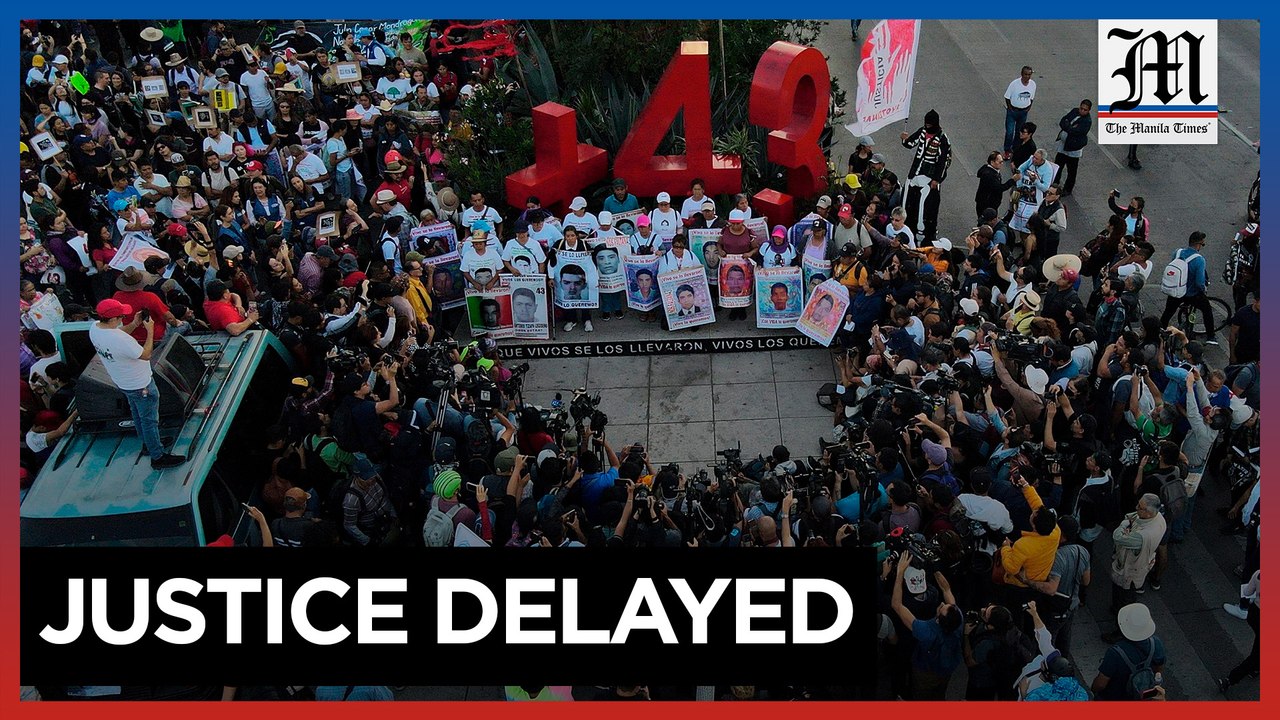 Families of 43 missing Mexican students march for answers after 9 years