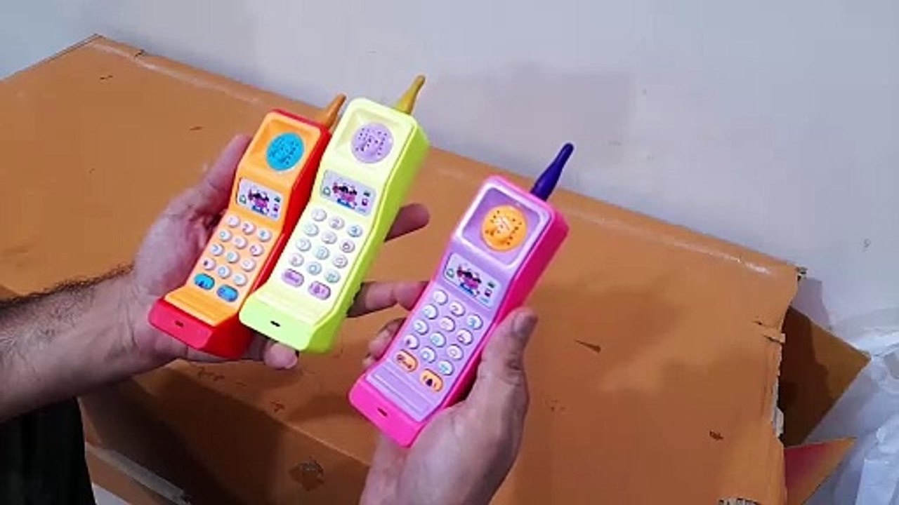 Unboxing and Review of Cordless Musical Toy Phone Mobile for Kids - Animal, Number and Keypress Sounds - Colorful Lights and Music Multicolor