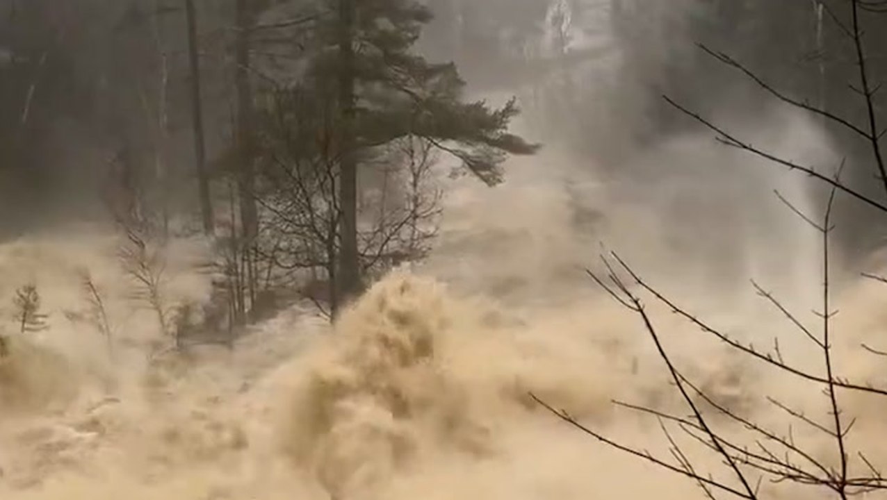Major flash floods crash through New Hampshire after storm