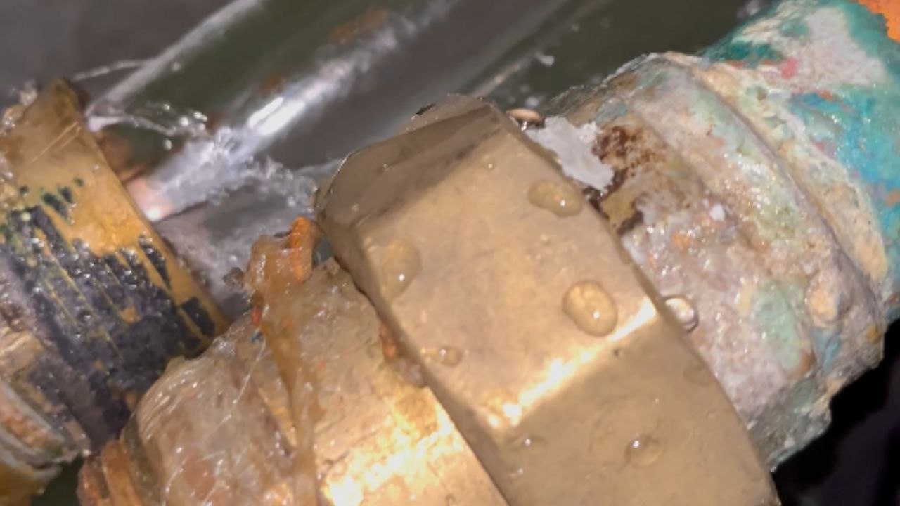 Insane length of solid ice coming out of a frozen pipe *Unbelievable Happening*