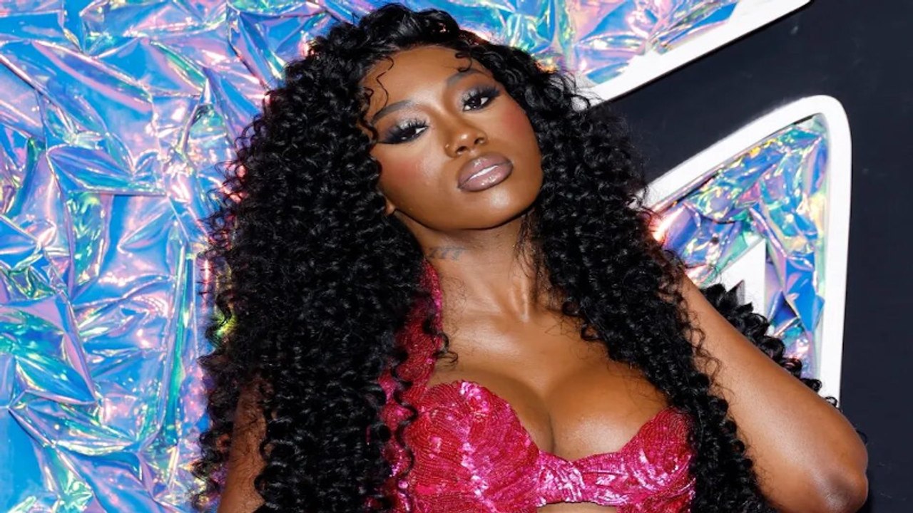 Flo Milli Remains Atop TikTok Billboard Top 50 | Billboard News