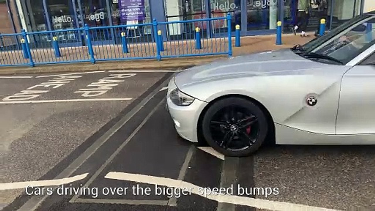 Car going over the bigger speed bumps