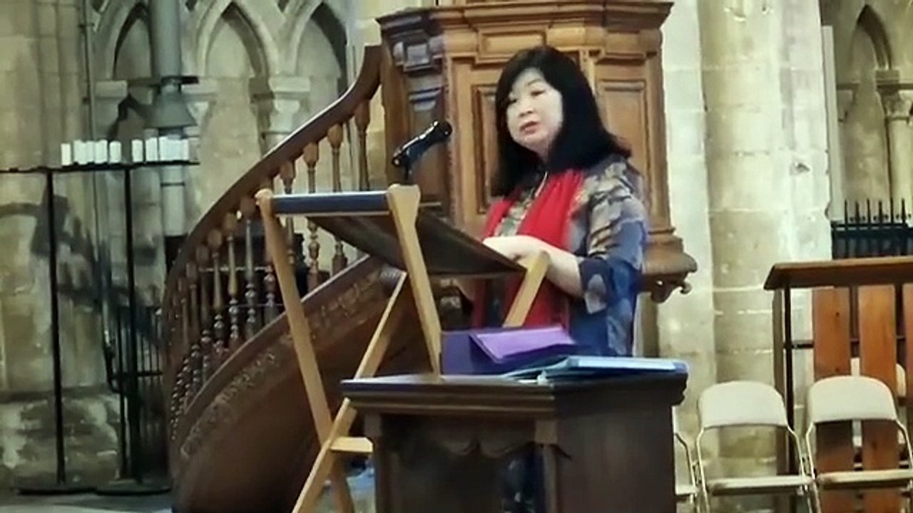 Faustina Yang accepts the King's Award for Voluntary Service