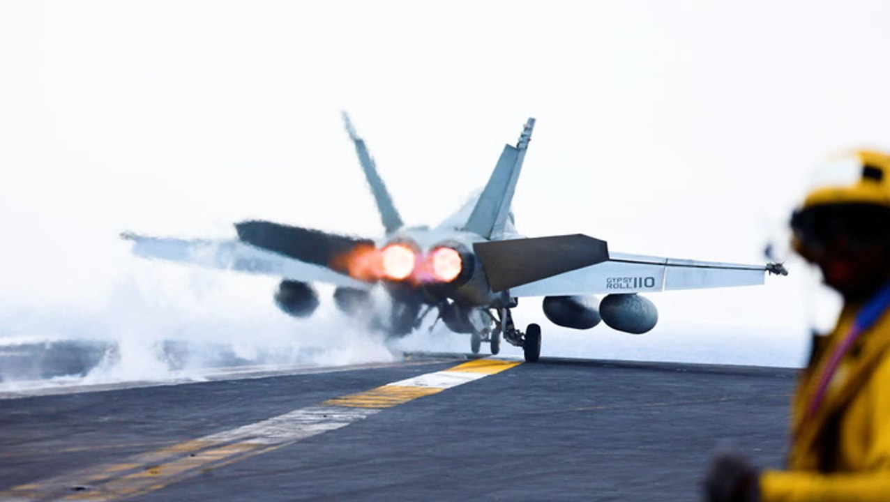 What it's like on board a US aircraft carrier fighting Houthis in the Red Sea