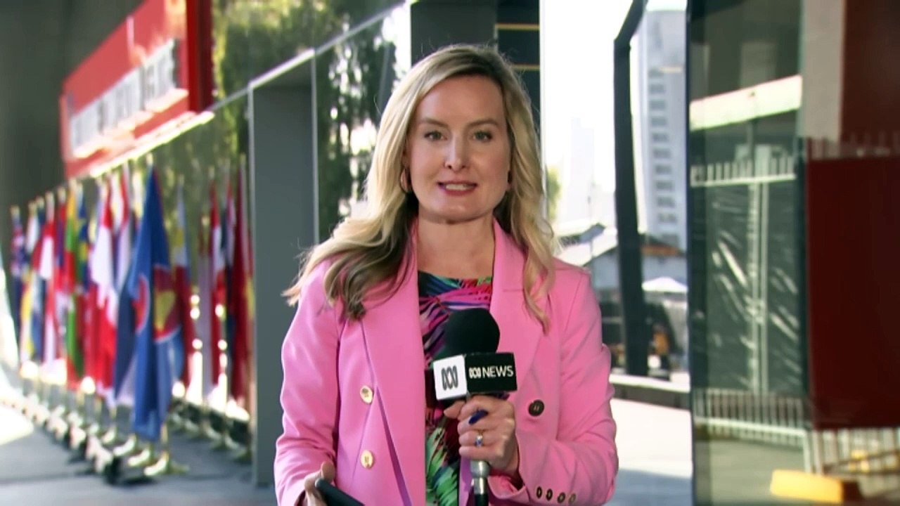 Climate protestors block Melbourne bridge during peak hour