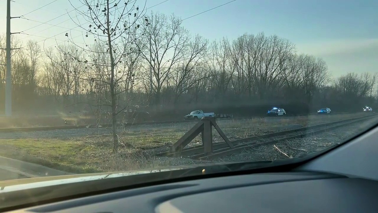 Police Chase Pickup Truck and Trailer Onto Train Tracks