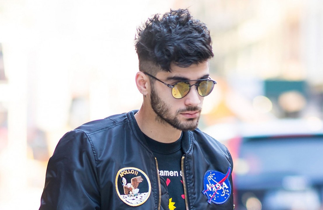 Zayn Malik has recalled saving Harry Styles from a pyrotechnic mishap
