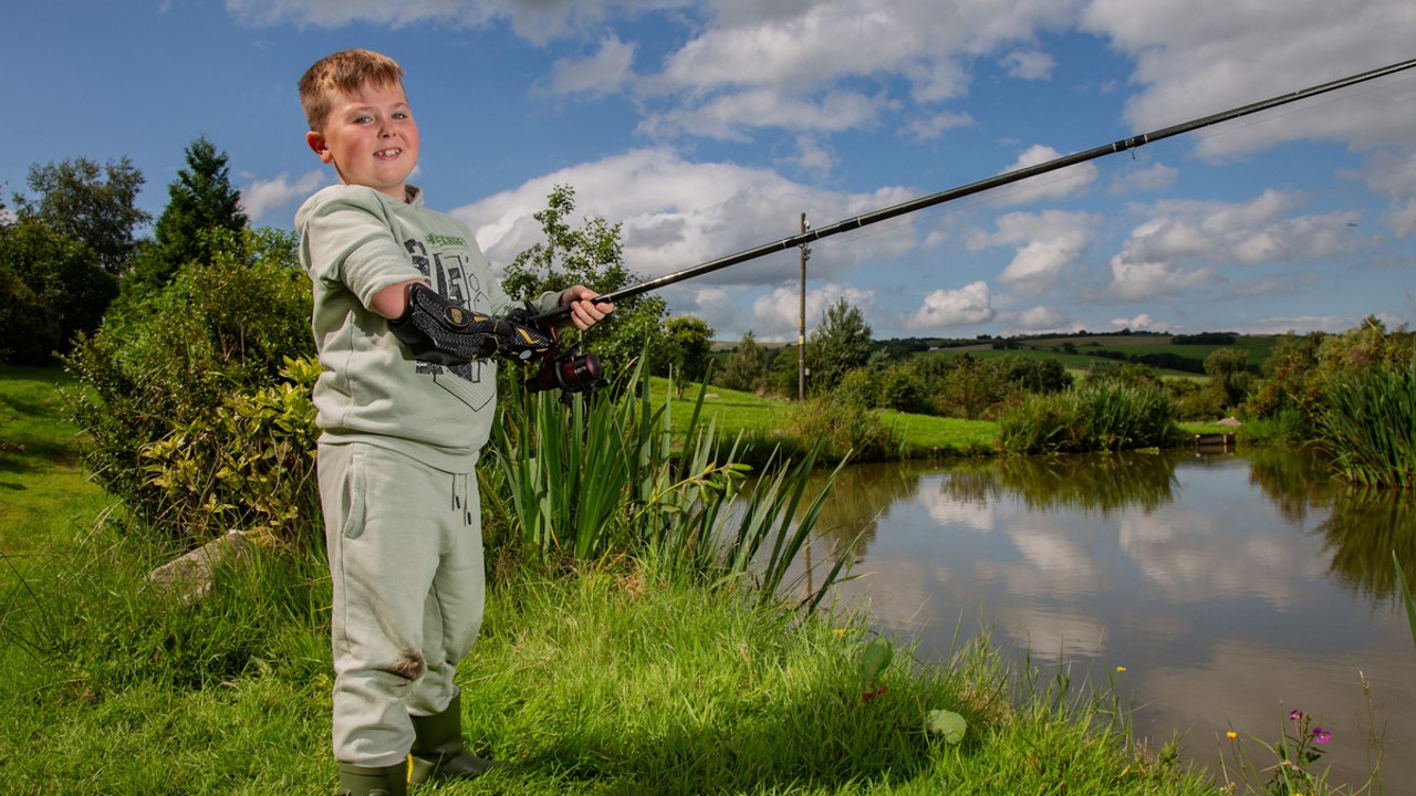 Seven-year-old boy born without an arm fishes for the first time thanks to a bionic arm!