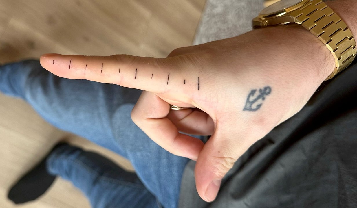'I had a handy idea to help me measure things - tattoo of a ruler on my finger'