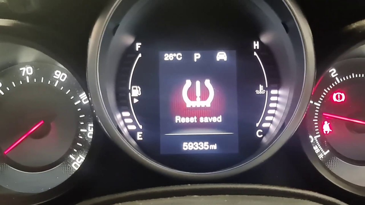 how to reset tyre pressure warning on Fiat 500X