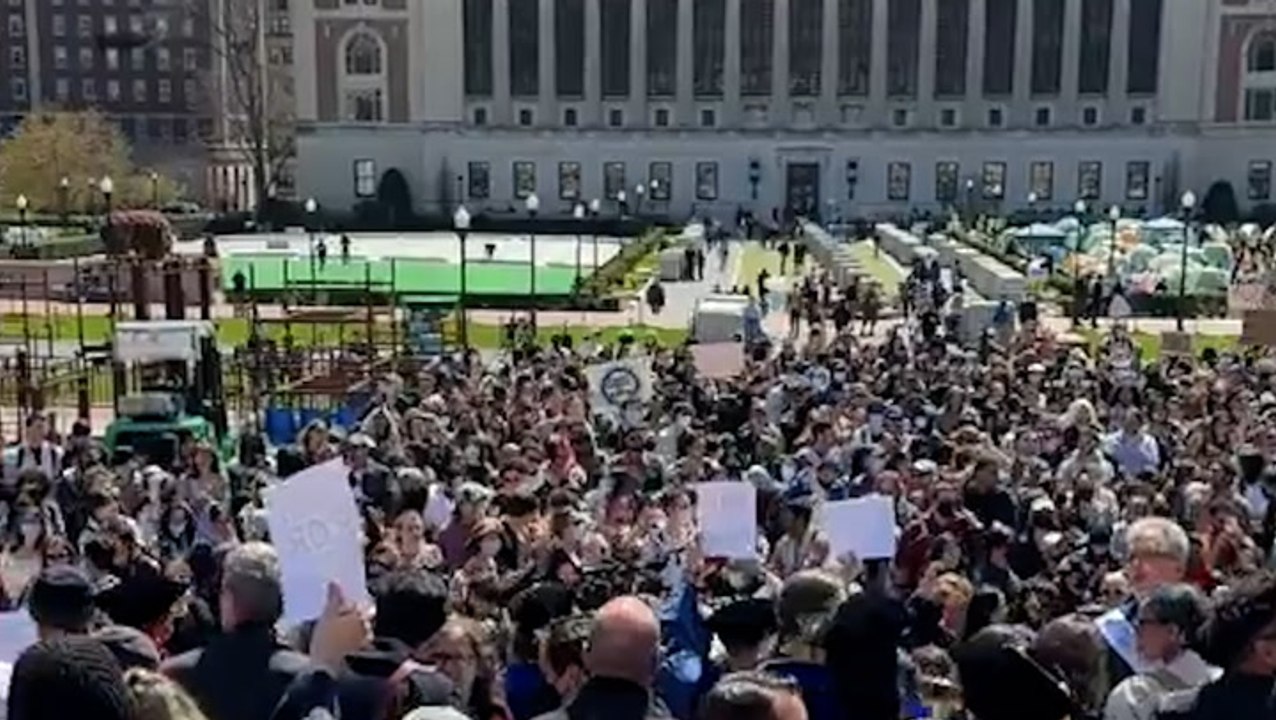 Massive crowd gathers as Columbia University faculty walk out after arrests of pro-Palestinian protesters