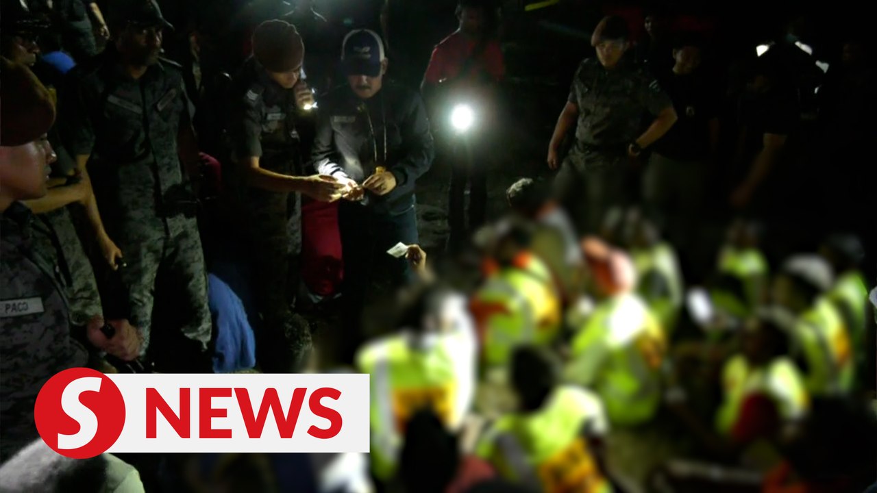 Immigration raids illegal settlement built on government reserve land in Sentul