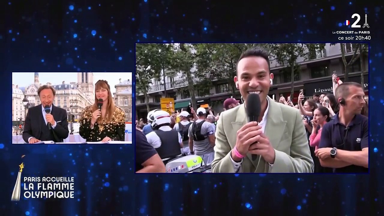 Pierre Garnier porte la flamme olympique à Paris