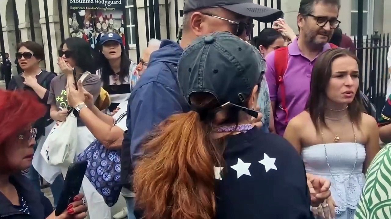 Watch: Shocking moment tourist gets bitten by King's Guard horse while posing for picture