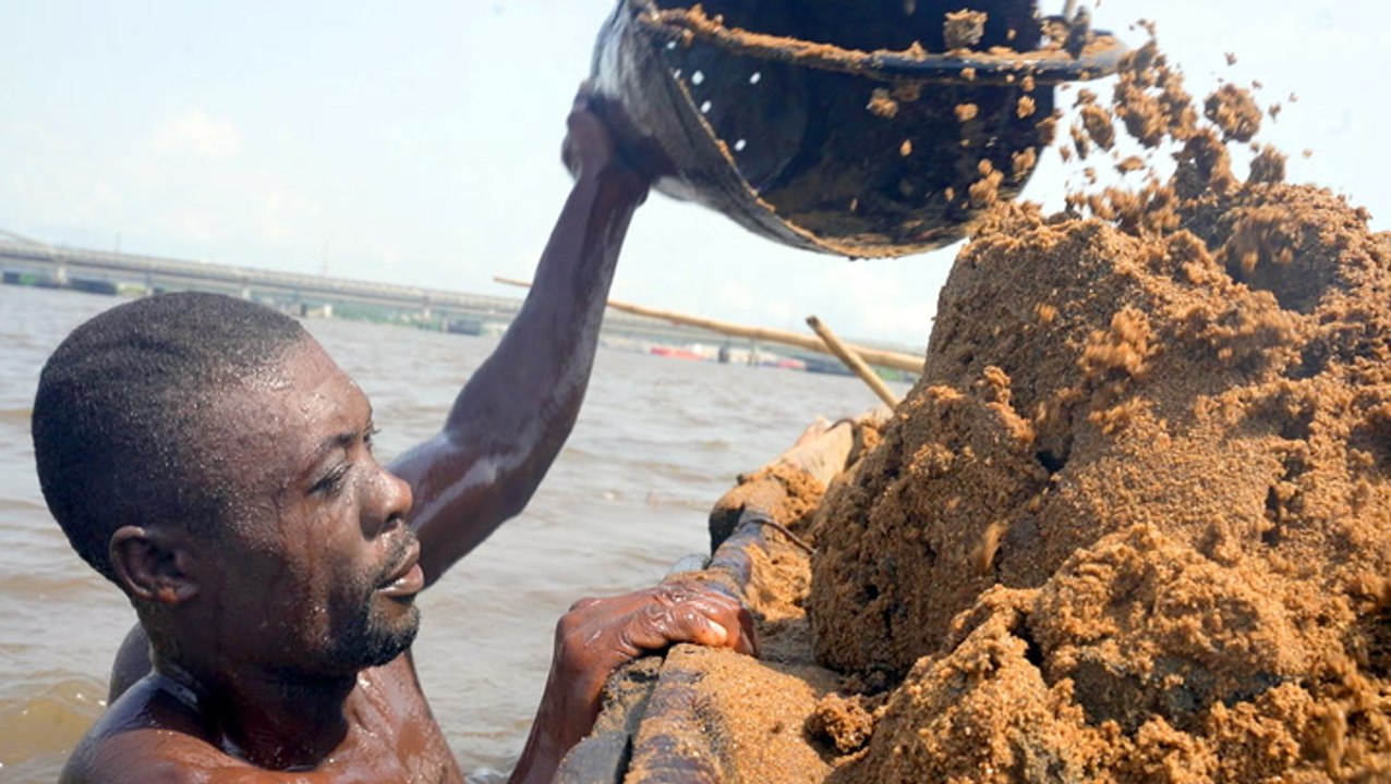 Why sand divers risk their lives 300 times a day for the world's most mined resource