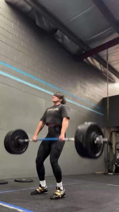 Fitness Trainer Does Weightlifting After Recovering From Bulging Disc Injury