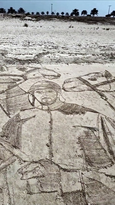 The man behind the viral images in the sand