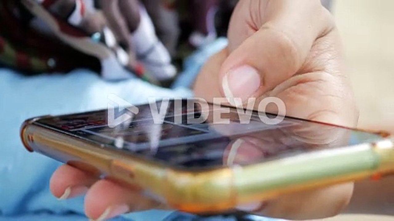 Close up of women hand holding smart phone
