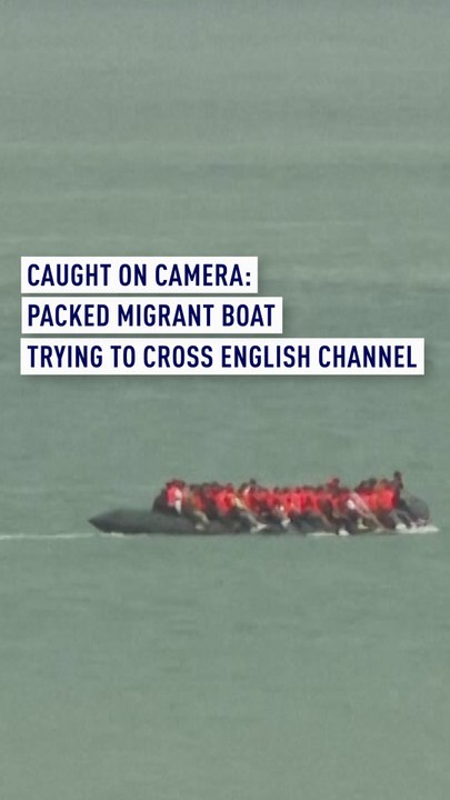 Packed migrant boat caught on video trying to cross English Channel